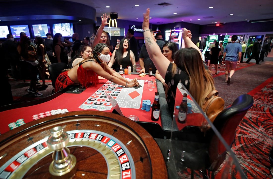 Gamblers in Las Vegas recently reopened casinos are attracting those who do not want to wear face shields