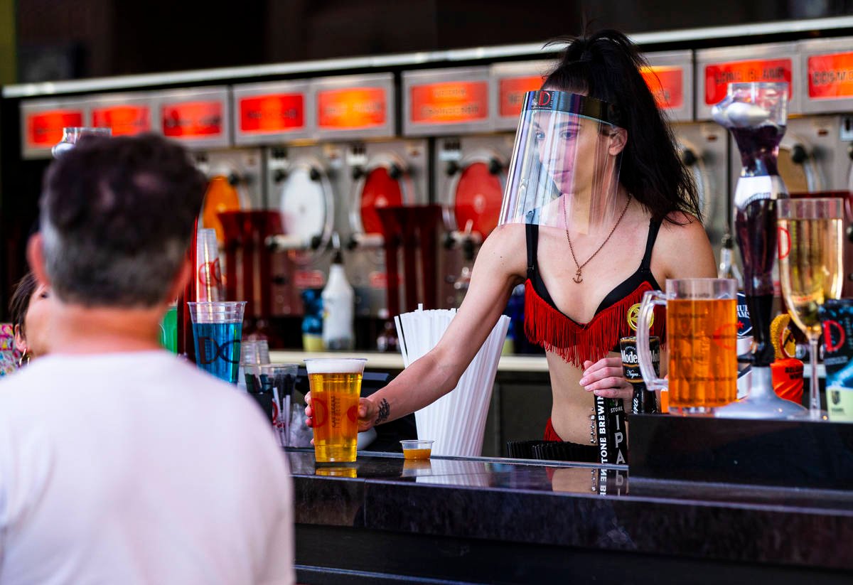 The new look of casino bartending includes full face shields