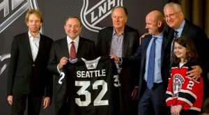 NHL officials all smiles after roping in new billionaires