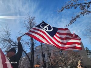 American flag with a peace sign at the 50501 protests at the Nevada state capital.