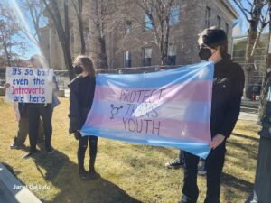 A protect trans youth flag at the Carson City, Nevada 50501 demonstration.